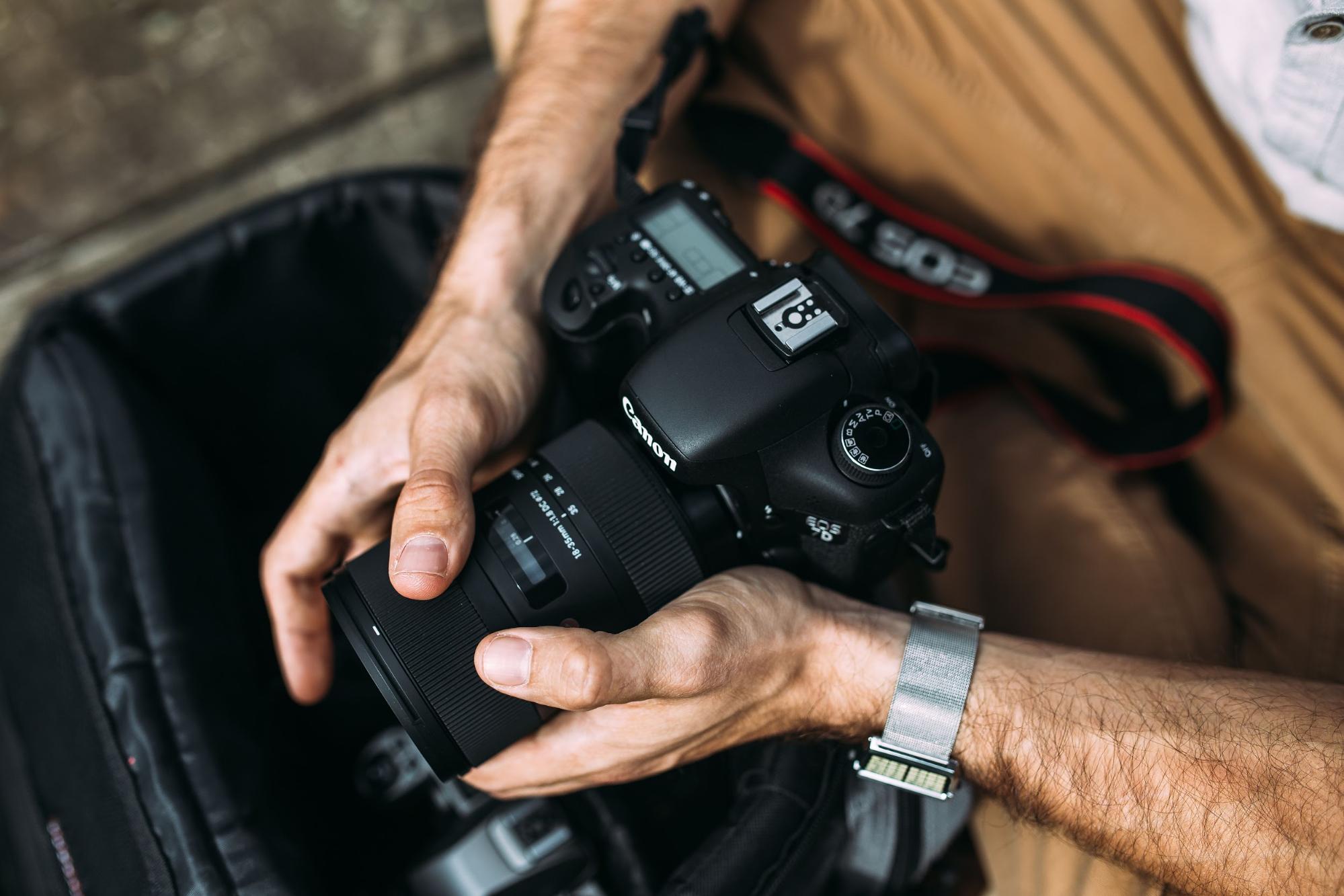 Video camera equipment in male hands